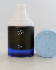 Clean, cleansing oil, with its cap off.
