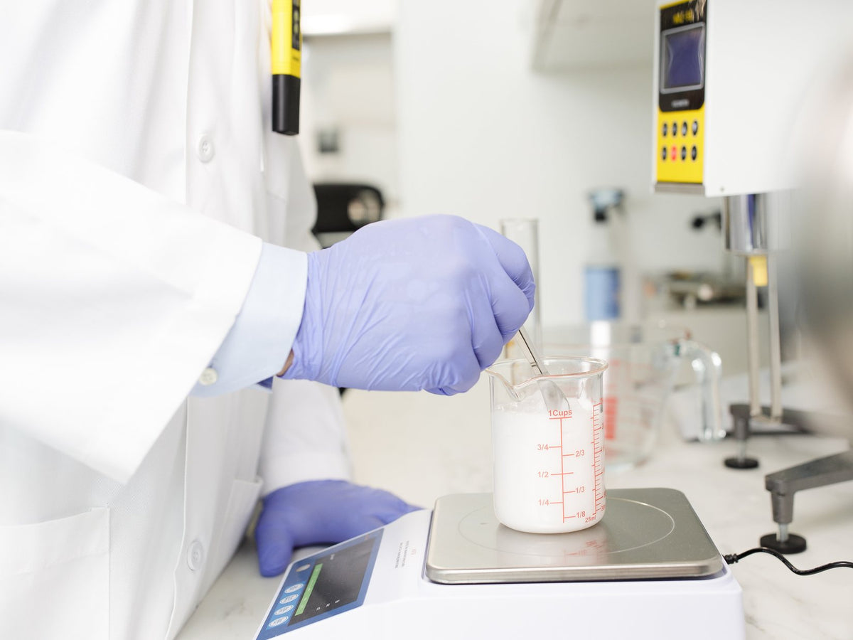 Weighing an ingredient for a batch