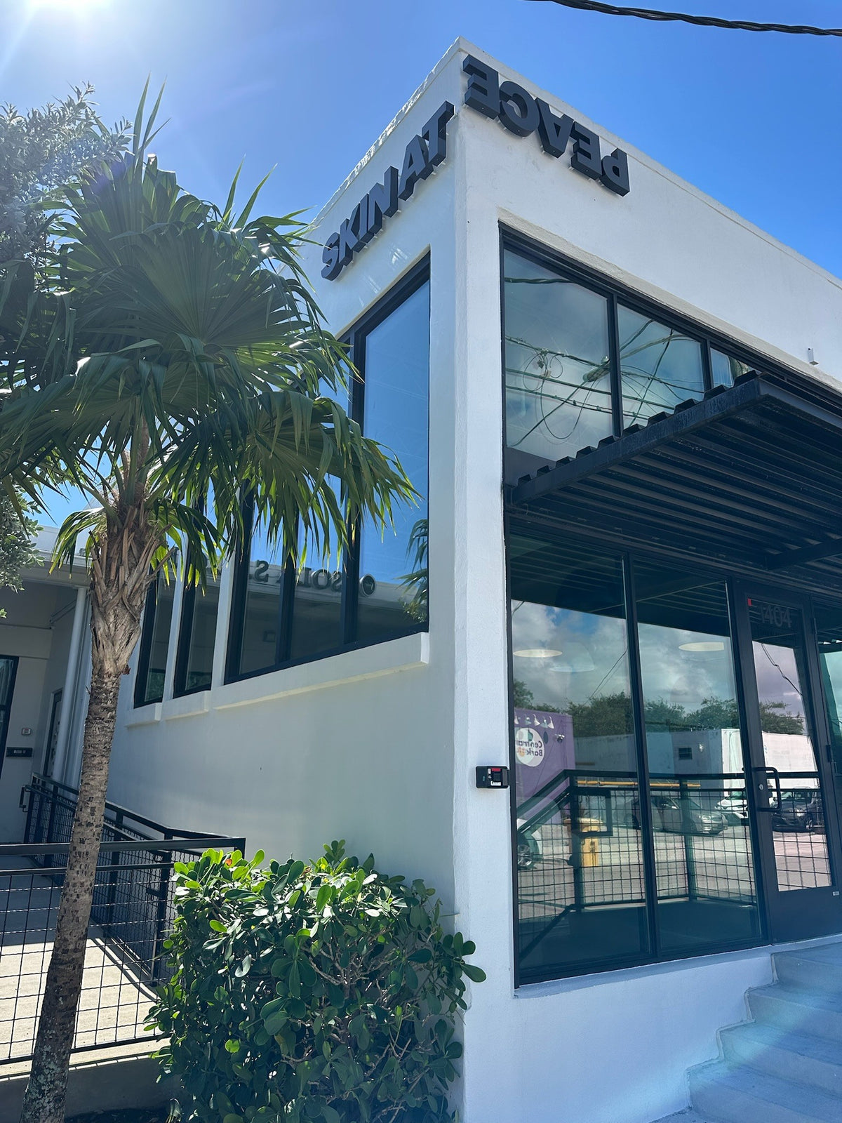 The Skin At Peace building, with the brand’s name over the door.